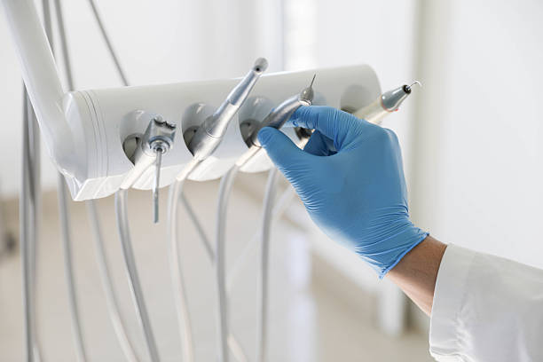 Professional Emergency Dentist technician working in Farmington, AR